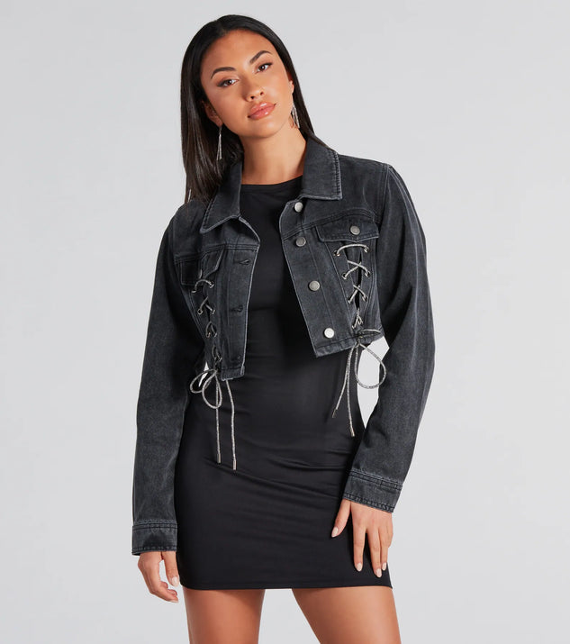 The Outshine In Rhinestone Lace-Up Denim Jacket in black is a women's workwear essential with an elevated fabric and chic silhouette, ideal for layering and versatile enough to take your look from office chic to going-out ready!
