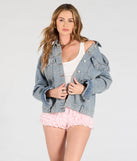 The Good Jeans Oversized Trucker Denim Jacket in denim blue brings edge and energy to your vibe, ready to elevate any festival look or concert outfit.