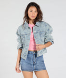 Stay on-trend this season with the Iconic Cutie Bow Trucker Denim Jacket in light blue, a must-have for creating stylish and effortless spring outfits for women.