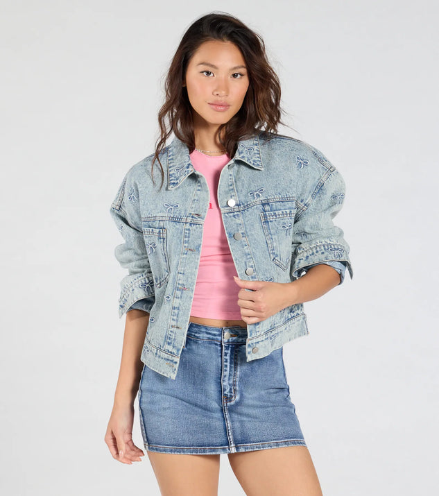 Stay on-trend this season with the Iconic Cutie Bow Trucker Denim Jacket in light blue, a must-have for creating stylish and effortless spring outfits for women.