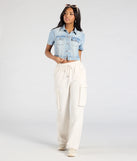 With its midriff cut and trend-forward fit, the Cutely Casual Short Sleeve Denim Jacket is a light blue crop top made to pair with skirts, denim, or whatever vibe you're feeling this season.