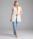 Dress up or down with the Sophisticated Vibe Double-Breasted Longline Vest, a trendy ivory blazer that delivers structure and style on the go.