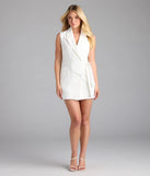 Step into summer looking effortlessly chic in the Sophisticated Vibe Double-Breasted Longline Vest in ivory, a must-have Windsor dress for your warm-weather wardrobe.