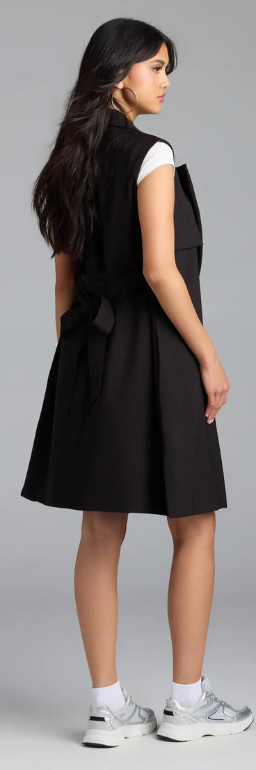 The Leave It Me Belted Long Vest brings versatile style to your wardrobe as a sleek, black vest for every season.