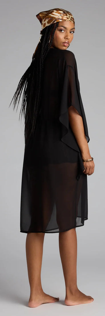 Refresh your wardrobe with the Destined For Sun Chiffon Kimono, a black fashion jacket that adds statement style to every look.