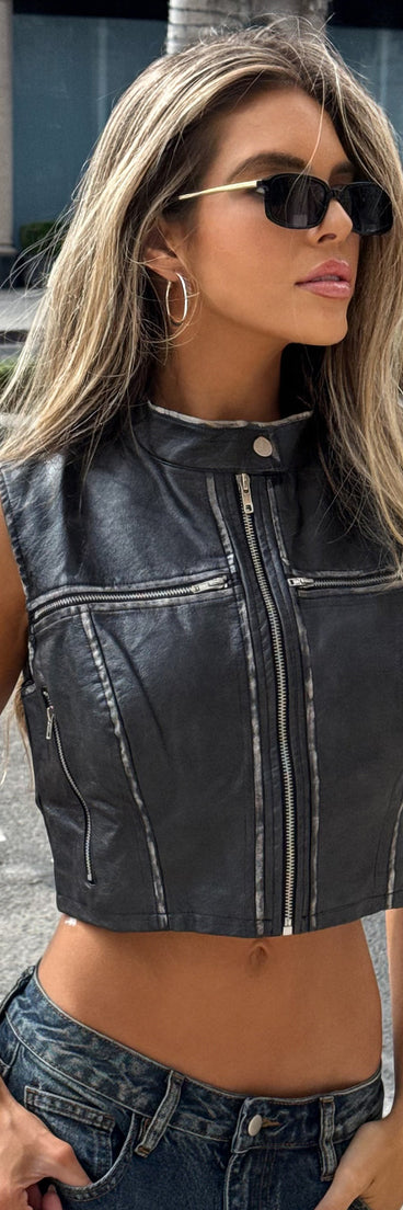 This black piece brings trend-right energy to the Throttle Babe Faux Leather Moto Vest, perfect for fall outfits that stand out.