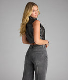 The Throttle Babe Faux Leather Moto Vest brings versatile style to your wardrobe as a sleek, black vest for every season.