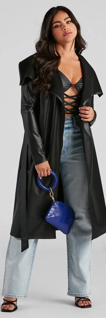 Stay chic this winter with Elevated And Chic Faux Leather Trench, a black women's coat perfect for layering. Featuring textured fabric and a trendy fit, this lightweight coat for women transitions effortlessly from cozy everyday wear to formal evening events.