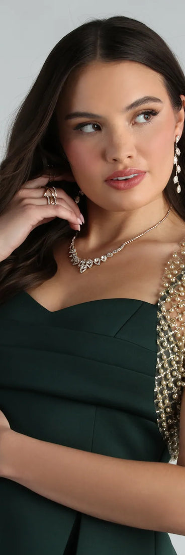 Complete your outfits with the Layer On Glamour Faux Pearl Glitter Bolero, a gold fashion jacket that adds stylish edge and versatile appeal.