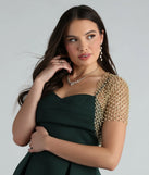 The Layer On Glamour Faux Pearl Glitter Bolero in gold brings sleek style to any graduation outfit, from cap and gown to after-party.