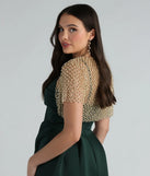 The Layer On Glamour Faux Pearl Glitter Bolero in gold brings sleek style to any graduation outfit, from cap and gown to after-party.