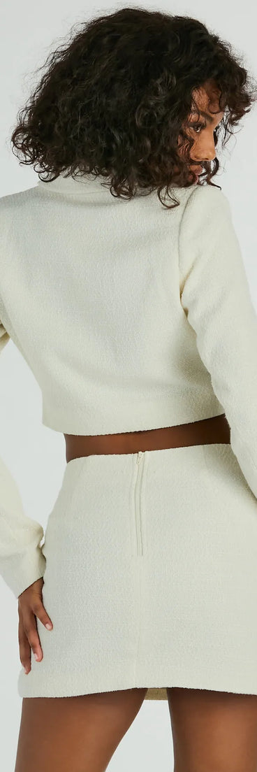 The Posh Pursuit Long Sleeve Tweed Crop Blazer in ivory is a women's workwear piece offering a trendy style and unique accents, perfect for effortlessly creating an outfit-of-the-day look that transitions your office look to going-out ready.