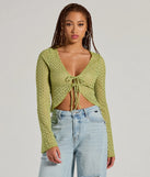 The Cabana Honey Tie Front Crochet Crop Sweater in lime green with a modern design and trendy look is part of the latest women's tops collection to elevate your 2025 wardrobe.