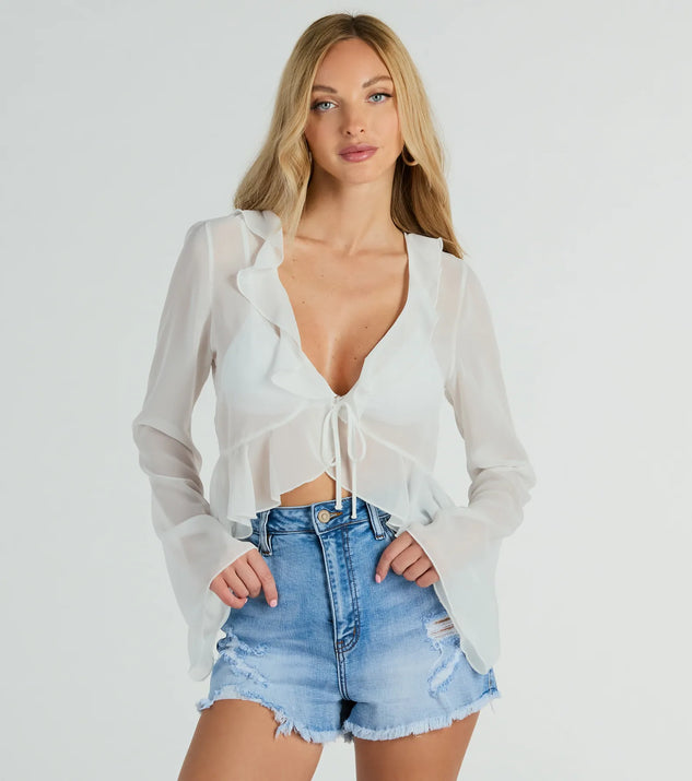 The crop top style of the Finding Inspiration Ruffled Tie Front Chiffon Top adds a sultry detail to your going-out outfits or everyday looks.