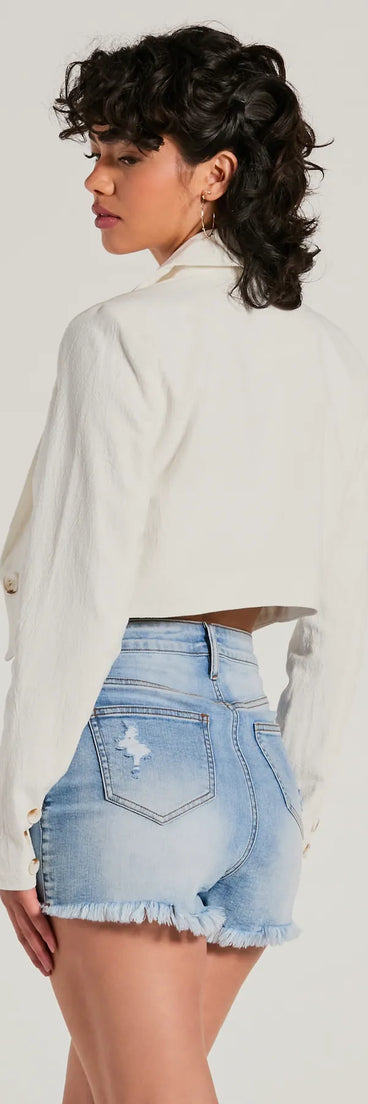 The Elevated Theme Long Sleeve Crop Linen Blazer in white is a women's workwear piece offering a trendy style and unique accents, perfect for effortlessly creating an outfit-of-the-day look that transitions your office look to going-out ready.