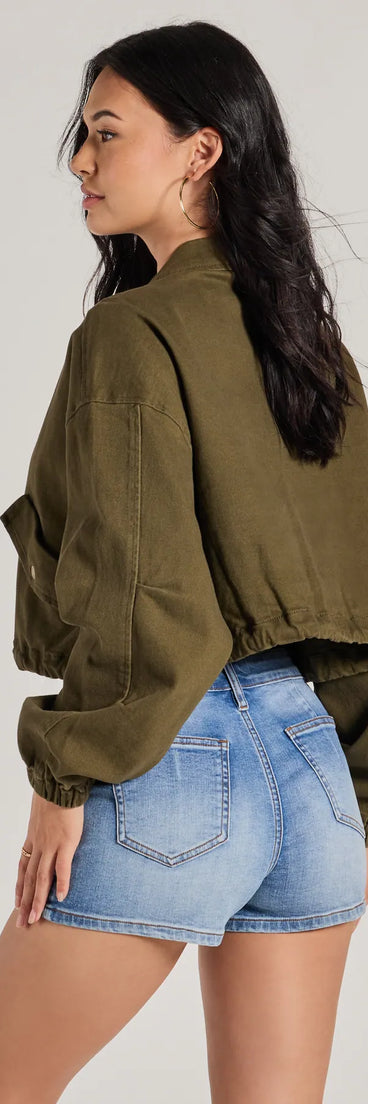 This olive green piece brings trend-right energy to the Top Notch Cargo Twill Crop Bomber Jacket, perfect for fall outfits that stand out.
