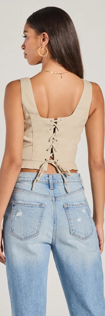The Effortless Style Lace-Up Crop Button Vest brings versatile style to your wardrobe as a sleek, taupe vest for every season.