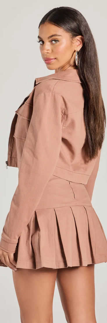 The Practical Charm Zip Up Denim Shacket in mauve is a women's workwear piece offering a trendy style and unique accents, perfect for effortlessly creating an outfit-of-the-day look that transitions your office look to going-out ready.