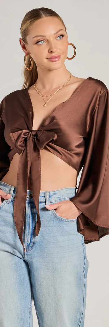 The Silky Satin Tie Front Crop Top in brown with a modern design and trendy look is part of the latest women's tops collection to elevate your 2025 wardrobe.