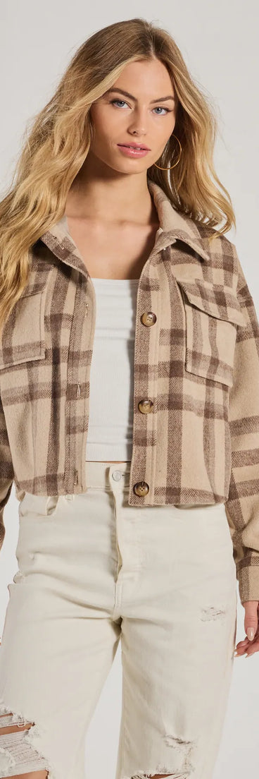 Complete your outfits with the Perfectly Plaid Woven Oversized Cropped Shacket, a taupe fashion jacket that adds stylish edge and versatile appeal.