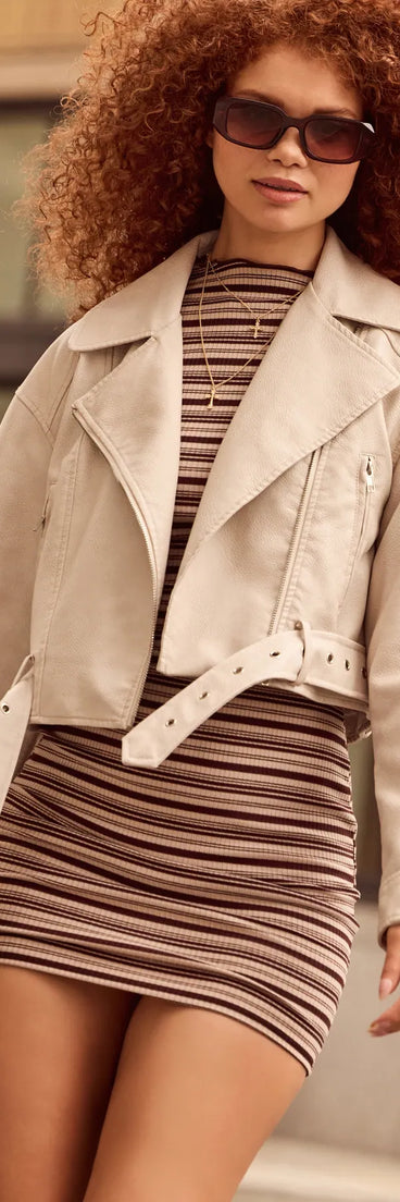 The Modern Icon Oversized Faux Leather Belted Moto Jacket in ivory is a women's workwear piece offering a trendy style and unique accents, perfect for effortlessly creating an outfit-of-the-day look that transitions your office look to going-out ready.