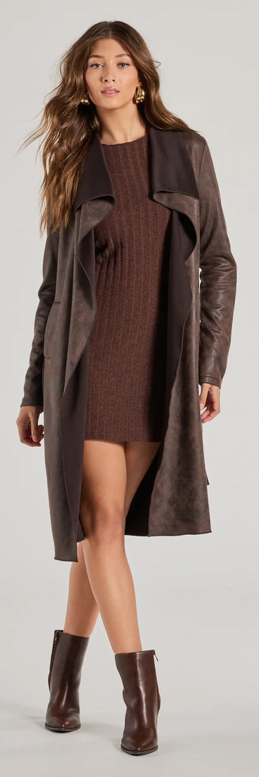 Stay chic this winter with Chic Impression Faux Suede Belted Trench Coat, a brown women's coat perfect for layering. Featuring textured fabric and a trendy fit, this lightweight coat for women transitions effortlessly from cozy everyday wear to formal evening events.