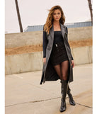 Stay chic this winter with Sleek Icon Faux Leather Long Belted Vest, a black women's coat perfect for layering. Featuring textured fabric and a trendy fit, this lightweight coat for women transitions effortlessly from cozy everyday wear to formal evening events.
