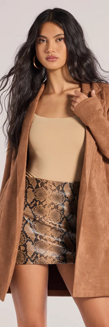 Top off your look with the On The Move Faux Suede Long Blazer, a brown blazer that adds sharp structure and polished edge to any outfit.
