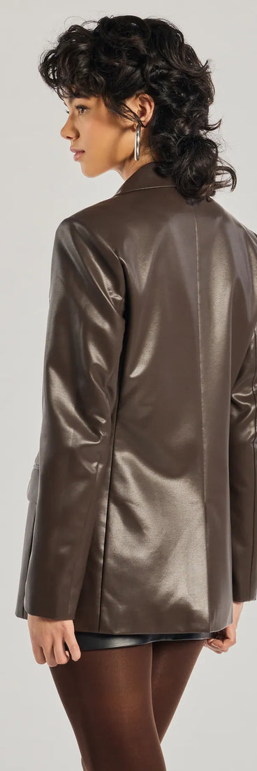 Bring statement edge with the Keep It Trendy Oversized Faux Leather Blazer, a brown faux leather jacket that adds sleek, trend-driven appeal to any dressy or casual outfit.