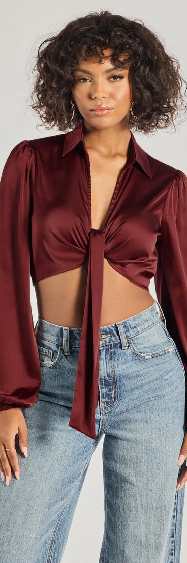 Add a sleek touch to your outfit with this burgundy long sleeve top—the Sleek Mood Satin Tie-Front Crop Top makes effortless transitions from desk to dinner.