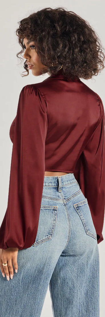 With its midriff cut and trend-forward fit, the Sleek Mood Satin Tie-Front Crop Top is a burgundy crop top made to pair with skirts, denim, or whatever vibe you're feeling this season.