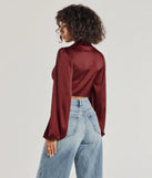 With its midriff cut and trend-forward fit, the Sleek Mood Satin Tie-Front Crop Top is a burgundy crop top made to pair with skirts, denim, or whatever vibe you're feeling this season.