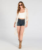The Desert Dreamer Crochet Lace Kimono in ivory brings edge and energy to your vibe, ready to elevate any festival look or concert outfit.