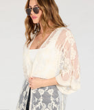The Desert Dreamer Crochet Lace Kimono in ivory brings edge and energy to your vibe, ready to elevate any festival look or concert outfit.