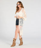 The Desert Dreamer Crochet Lace Kimono in ivory brings edge and energy to your vibe, ready to elevate any festival look or concert outfit.