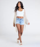 Stay on-trend this season with the Sun Seeker Sheer Crochet Kimono in natural, a must-have for creating stylish and effortless summer outfits for women.