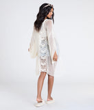 Stay on-trend this season with the Sun Seeker Sheer Crochet Kimono in natural, a must-have for creating stylish and effortless spring outfits for women.