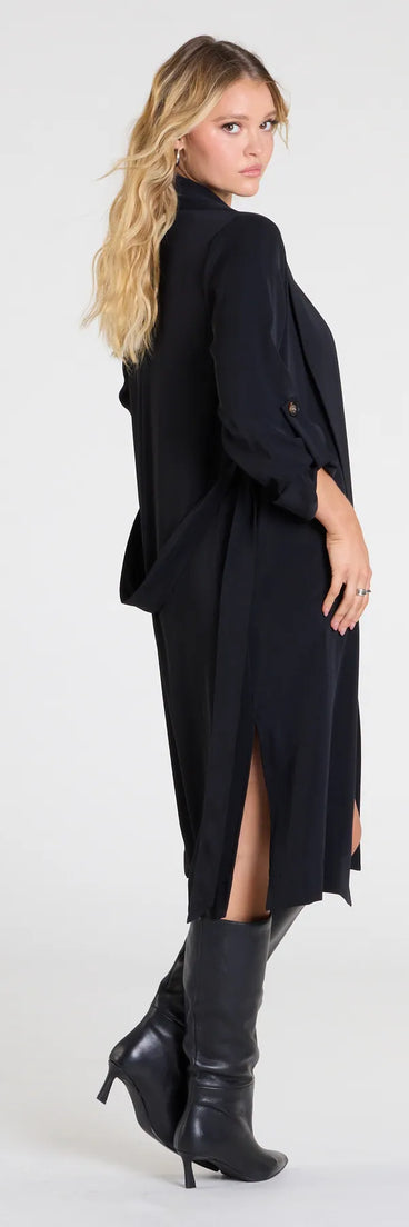 Refresh your wardrobe with the Stylish Season Belted Duster Trench Coat, a black fashion jacket that adds statement style to every look.