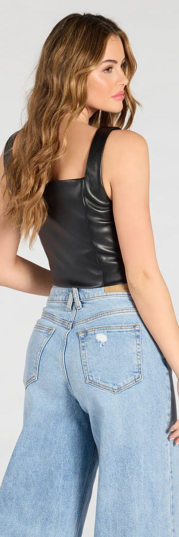 With its midriff cut and trend-forward fit, the Attractive Influence Square Neck Button Vest is a black crop top made to pair with skirts, denim, or whatever vibe you're feeling this season.