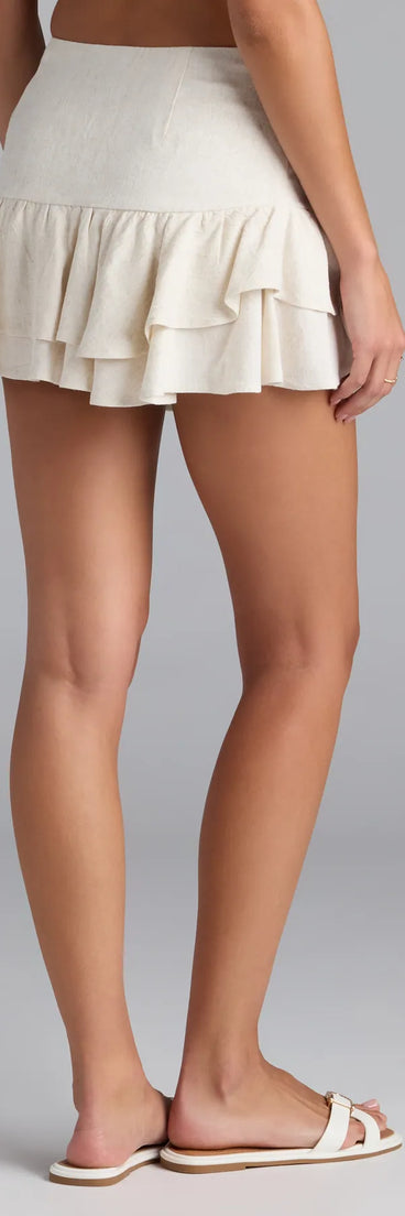 The One Short Day Linen High-Rise Ruffle Mini Skirt in natural features a short, flattering cut designed to elevate your look with just the right amount of edge.