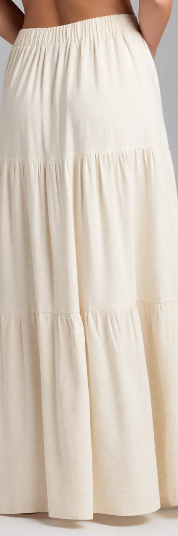 Designed for campus outfits, sleek workwear, and on-the-go moments, the Coastal Breeze Linen High Slit Maxi Skirt is a trendy natural bottom for women bringing effortless fall versatility.