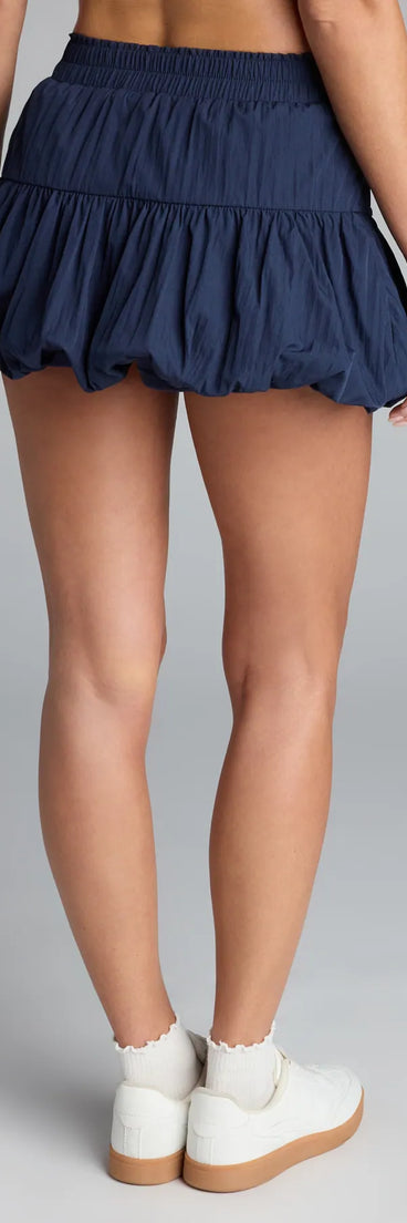 Designed for campus outfits, sleek workwear, and on-the-go moments, the Too Cute Bubble Hem Mini Skirt is a trendy navy blue bottom for women bringing effortless fall versatility.