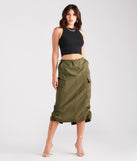 The She's A Trendsetter Nylon Parachute Midi Skirt in olive is a women's workwear piece offering a trendy style and unique accents, perfect for effortlessly creating an outfit-of-the-day look that transitions your office look to going-out ready.