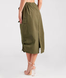 The She's A Trendsetter Nylon Parachute Midi Skirt is a olive cargo skirt, an effortlessly layer-friendly piece ideal for a holiday-ready look with a funtional-inspired flair.
