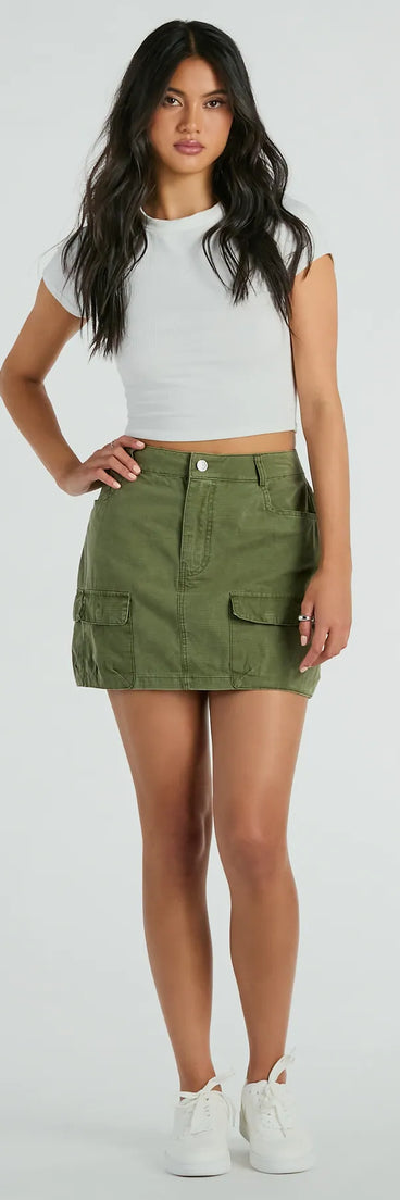 The Attention Please High-Rise Cargo Mini Skirt is a olive cargo skirt, an effortlessly layer-friendly piece ideal for a celebration-ready look with a funtional-inspired flair.