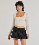 The Sporty Spice High-Rise Striped Bubble Skirt in black features a short, flattering cut designed to elevate your look with just the right amount of edge.