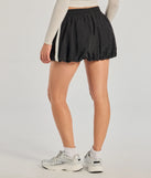 Create bold, fashion-forward looks for spring or summer with the Sporty Spice High-Rise Striped Bubble Skirt in black, a must-have piece from Windsor’s collection of stylish bottoms for women.