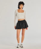 The Sporty Spice High-Rise Striped Bubble Skirt is a trendy women's bottom in black, designed with modern details and alluring textures to complete chic outfits for 2025.