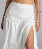 The Breezy Babe High-Rise Slit Maxi Skirt in white brings edge and energy to your vibe, ready to elevate any festival look or concert outfit.