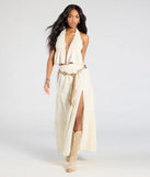 Create bold, fashion-forward looks for spring or summer with the Free Spirit High-Rise Embroidered Slit Maxi Skirt in beige, a must-have piece from Windsor’s collection of stylish bottoms for women.